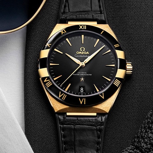 Black and 2024 gold omega